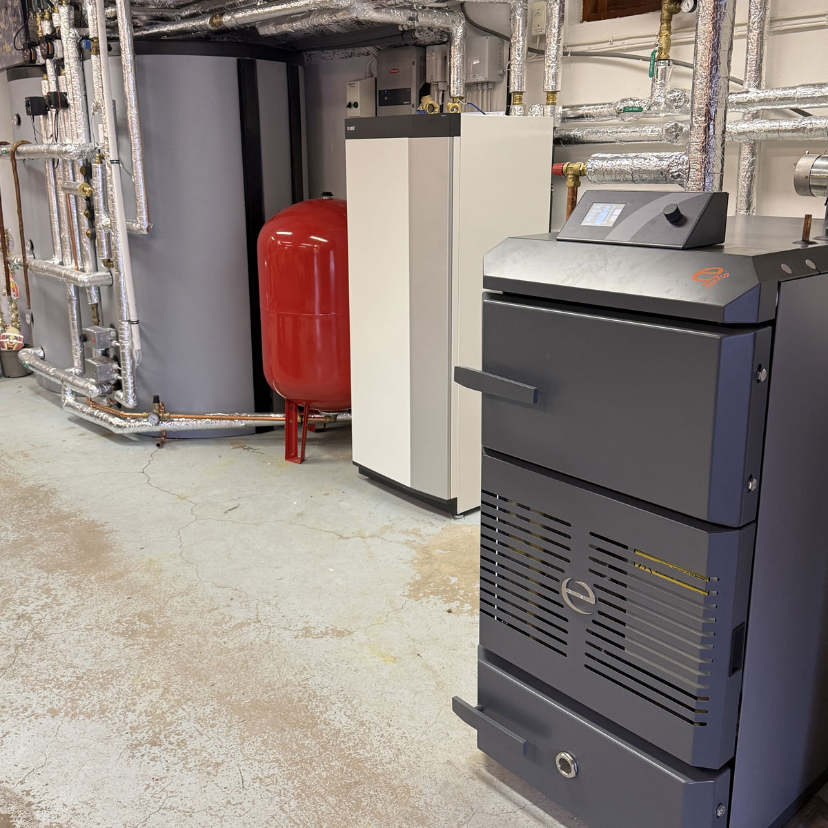 Vedpanna och värmepump